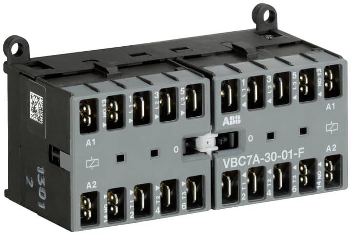 Elektrische Schützkontakteinheit mit der Bezeichnung 'VBC7A-30-01' mit mehreren Anschlusspunkten und einem schwarz-grauen Gehäuse, verwendet zur Steuerung von Stromkreisen.