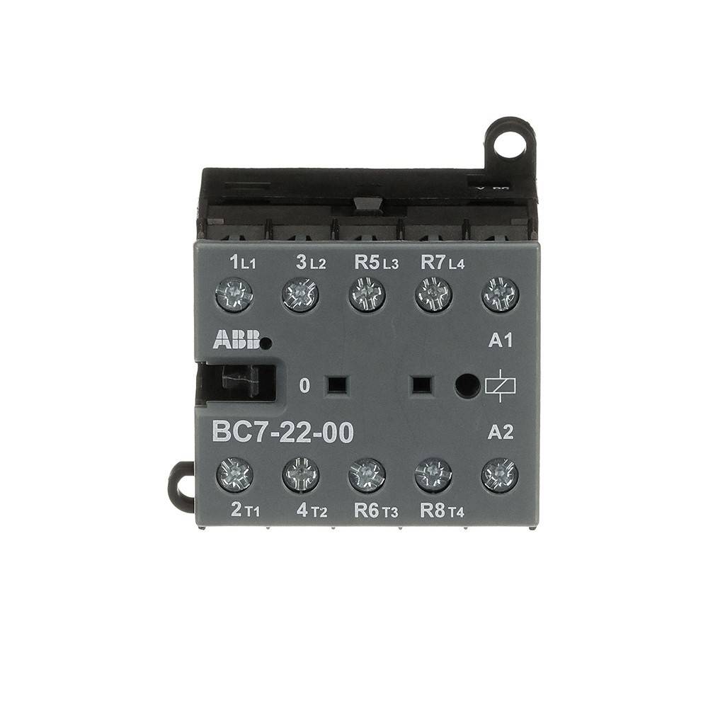 ABB BC7-22-00' elektrische Komponente mit mehreren Schraubklemmen, beschriftet von 1L1 bis 4T2, verwendet in industriellen Anwendungen.