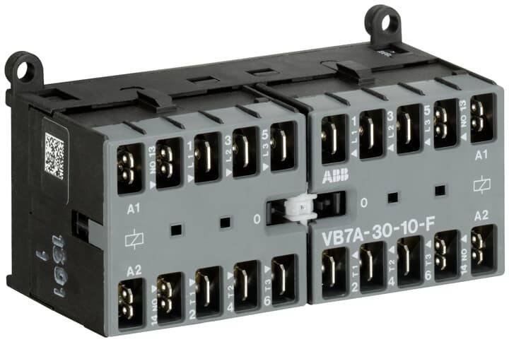 Ein elektrischer Schütz mit der Beschriftung 'VB7A-30-10', in Nahaufnahme dargestellt; ausgestattet mit mehreren Anschlussöffnungen und einer Spule, gekennzeichnet durch 'A1' und 'A2'.