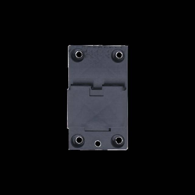 Eine schwarze elektronische Komponente mit sechs Löchern, wahrscheinlich zur Befestigung. Rechteckige Form mit einem zentralen vertieften Bereich. Keine sichtbaren Beschriftungen.