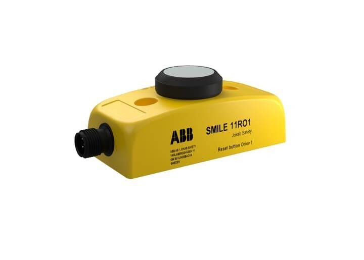 Ein gelbes ABB-Sicherheitsgerät mit der Bezeichnung 'SMILE 11R01', das oben einen Rückstellknopf besitzt und für Not-Aus-Anwendungen verwendet wird.