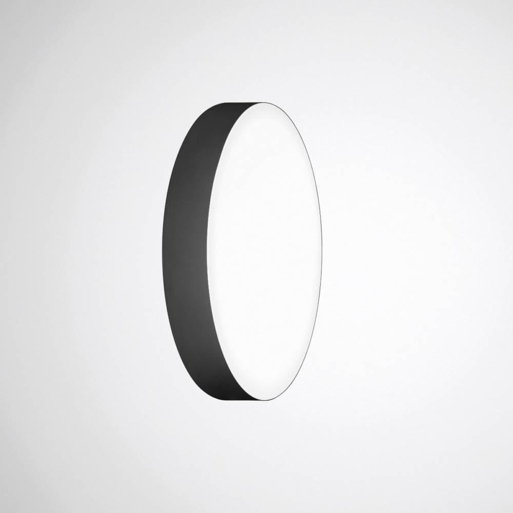 Eine runde, minimalistische Wandlampe mit einem schwarzen Außenrand und einem hellen weißen Lichtmittelpunkt, montiert auf einem schlichten weißen Hintergrund.