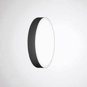 Eine moderne, kreisförmige Wandlampe mit einem eleganten schwarzen Rahmen und weißem Licht, an einer schlichten weißen Wand montiert, die minimalistische Beleuchtung bietet.