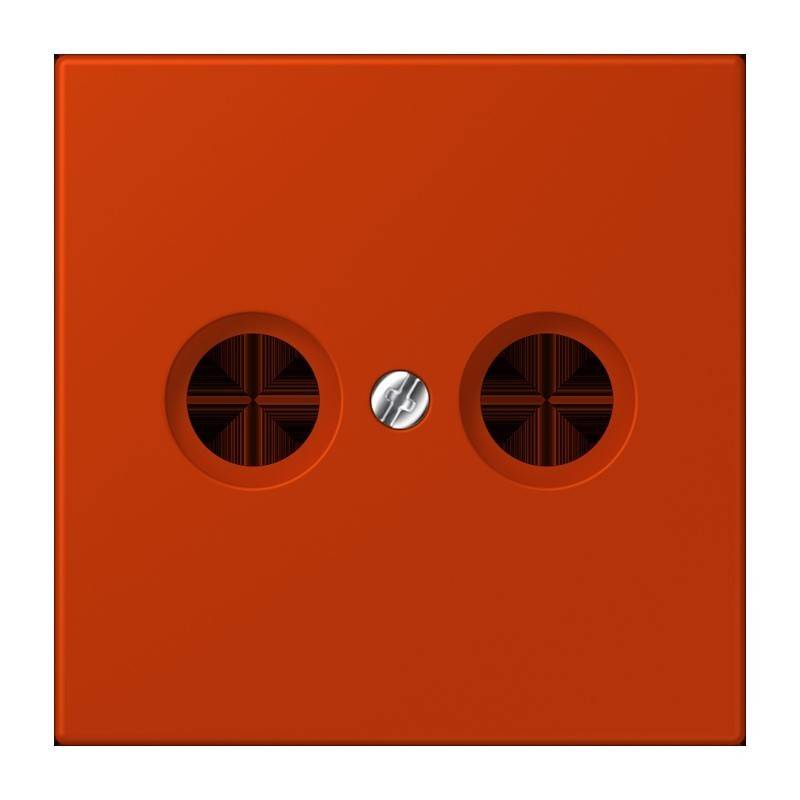 Ein orangefarbenes quadratisches Lautsprechergitter mit zwei runden, dunklen Maschönffnungen und einer zentralen silbernen Schraube.