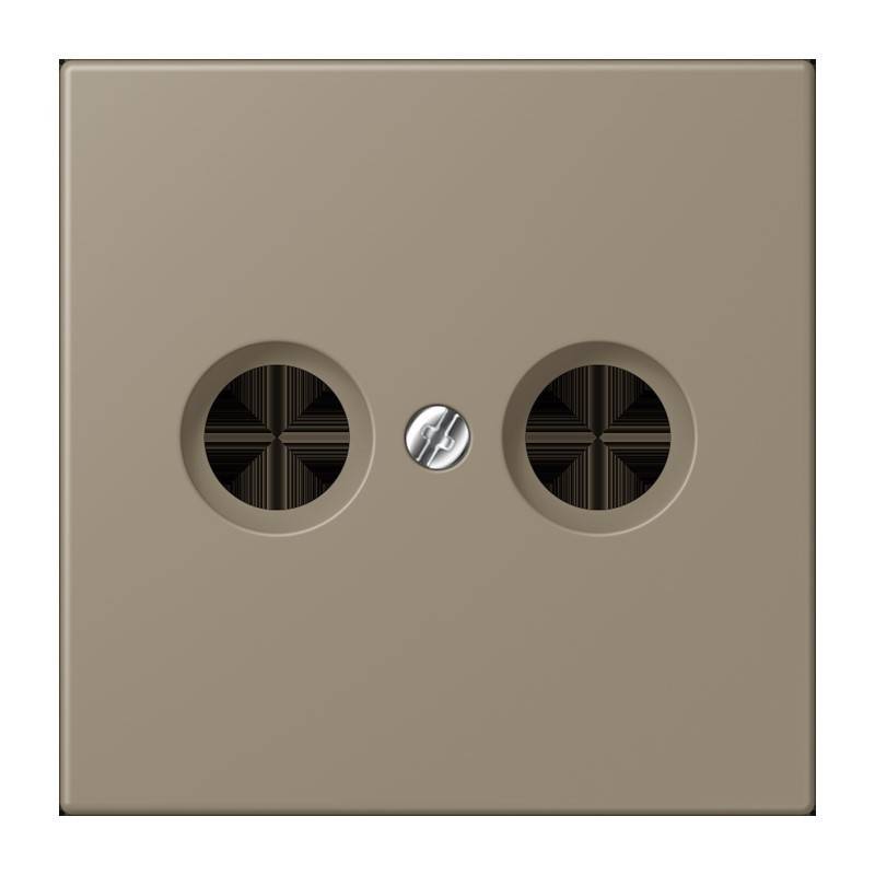 Nahaufnahme einer beigen Wandsteckdose mit zwei runden Steckdosen und einer zentralen Schraube.