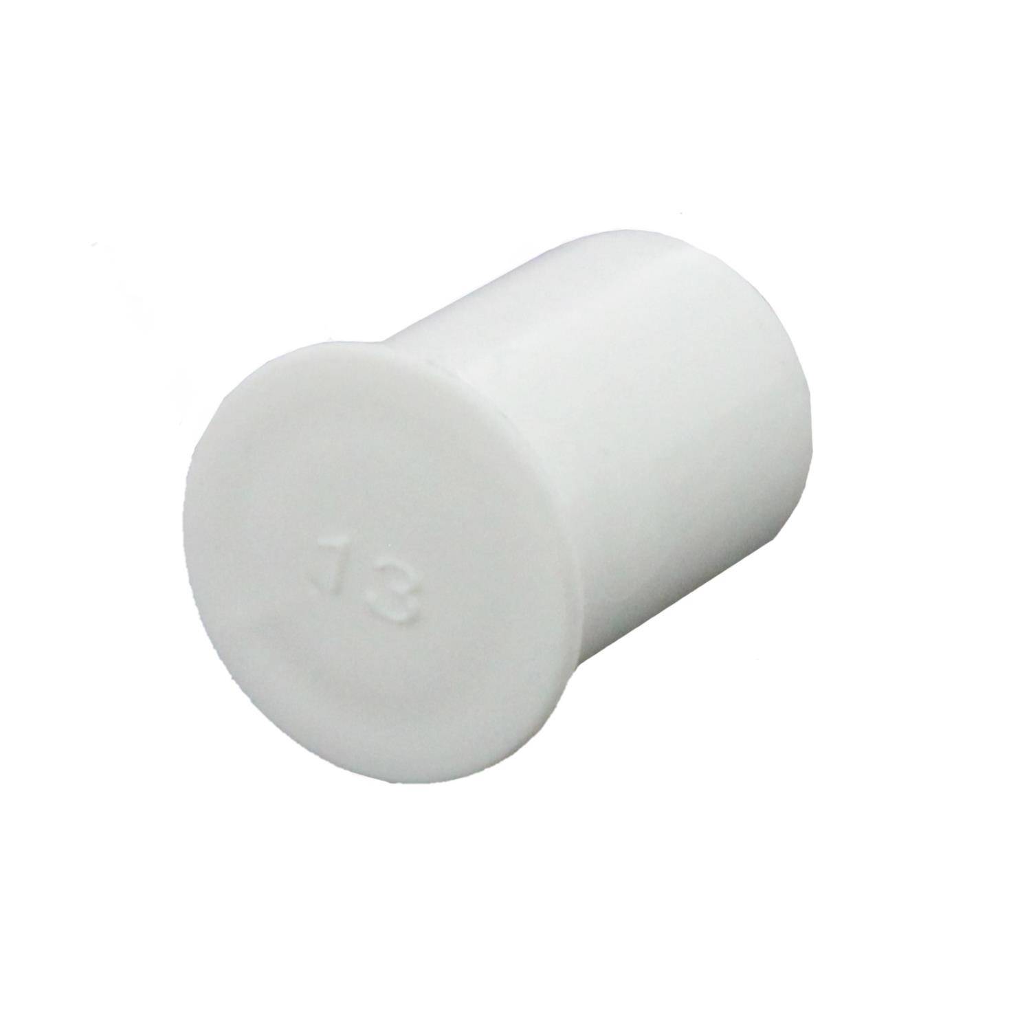 „Eine weiße Kunststoffkappe mit der eingeprägten Nummer 13 auf der Oberseite.