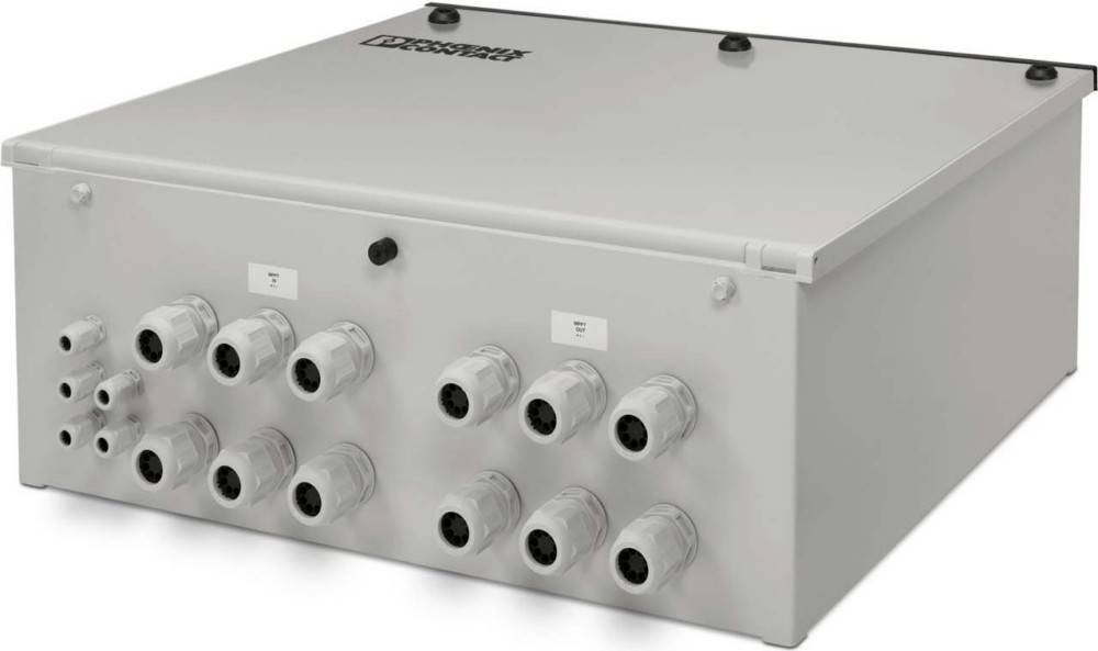 Eine graue elektrische Steuerbox mit mehreren kreisförmigen Anschlüssen an einer Seite. Der Markenname erscheint oben links.