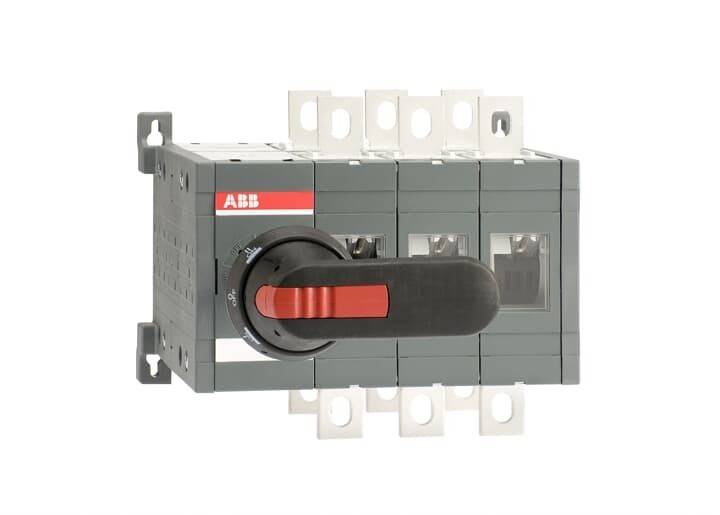 Ein schwarzer und roter Drehschalter, der an einem grauen Elektrokasten montiert ist, mit sichtbaren Anschlusspunkten und der Beschriftung 