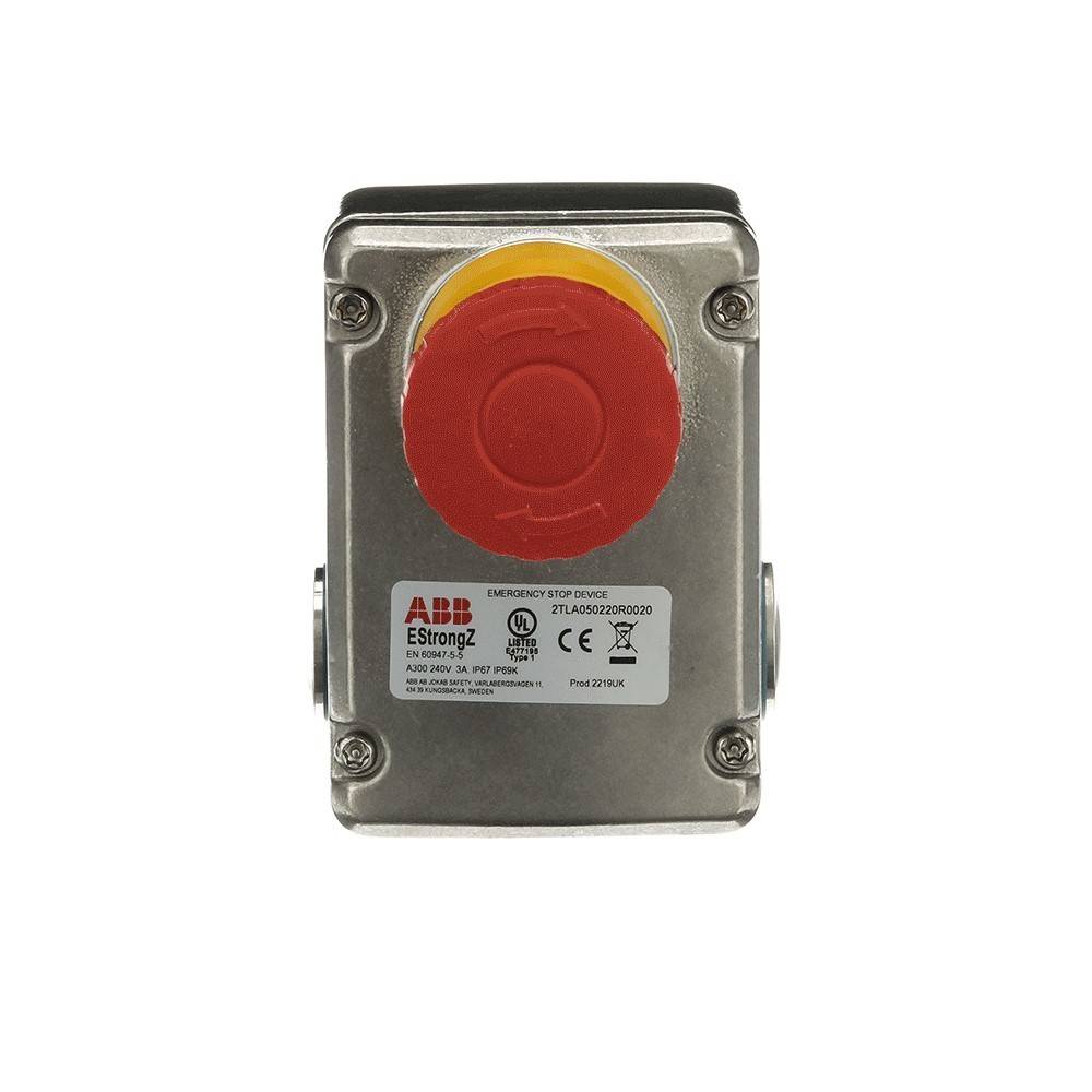 Roter Notaus-Taster an einem Metallgehäuse mit der Aufschrift 