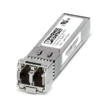 Ein silbernes Phoenix Contact Glasfaser-Transceiver-Modul mit Dualanschlüssen und gedrucktem Etikett, das für die Hochgeschwindigkeitsdatenübertragung in Netzwerkgeräten verwendet wird.