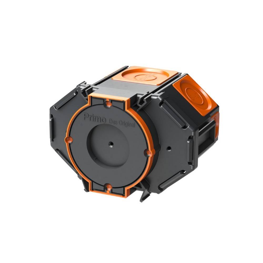 Ein kleines, schwarzes und orangefarbenes modulares Gerät mit mehreren Anschlusspunkten, möglicherweise ein Werkzeug oder eine Komponente, mit der Bezeichnung 'Primo'.