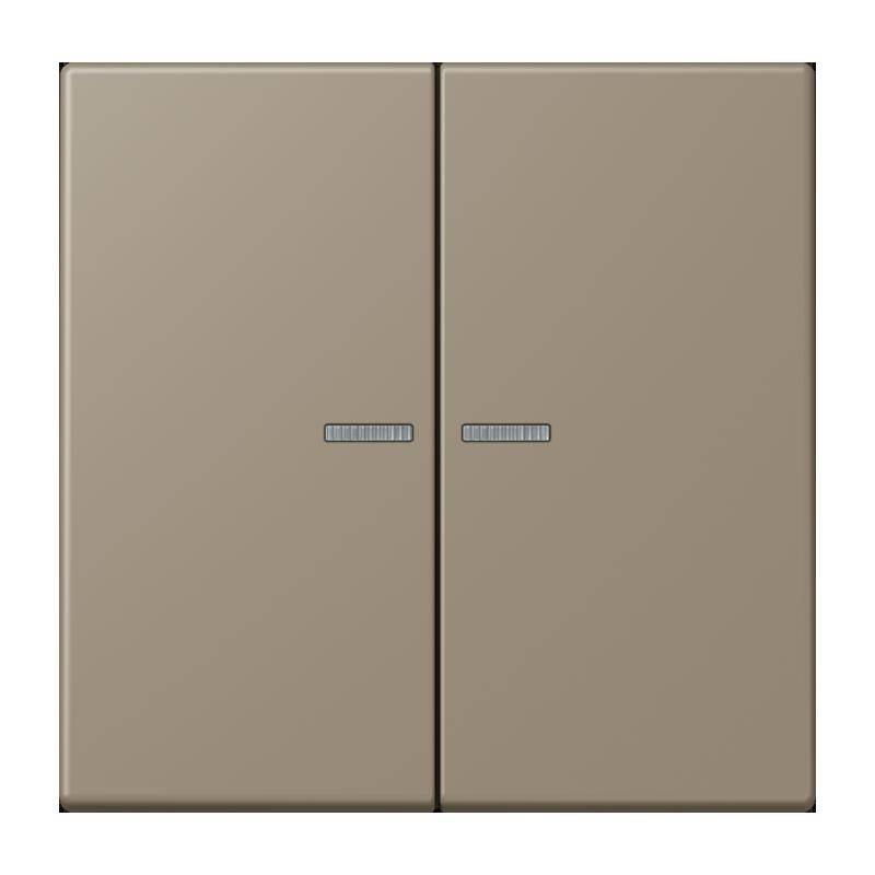 Eine beige Doppel-Lichtschalter mit horizontalen gerillten Griffen in der Mitte jedes Schalters.