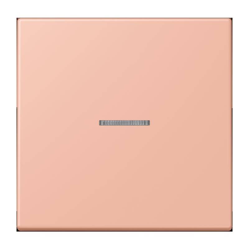 Ein quadratischer, erdbeerfarben-rosa Lichtschalter mit einem horizontalen silbernen Streifen in der Mitte, vor einem weißen Hintergrund.