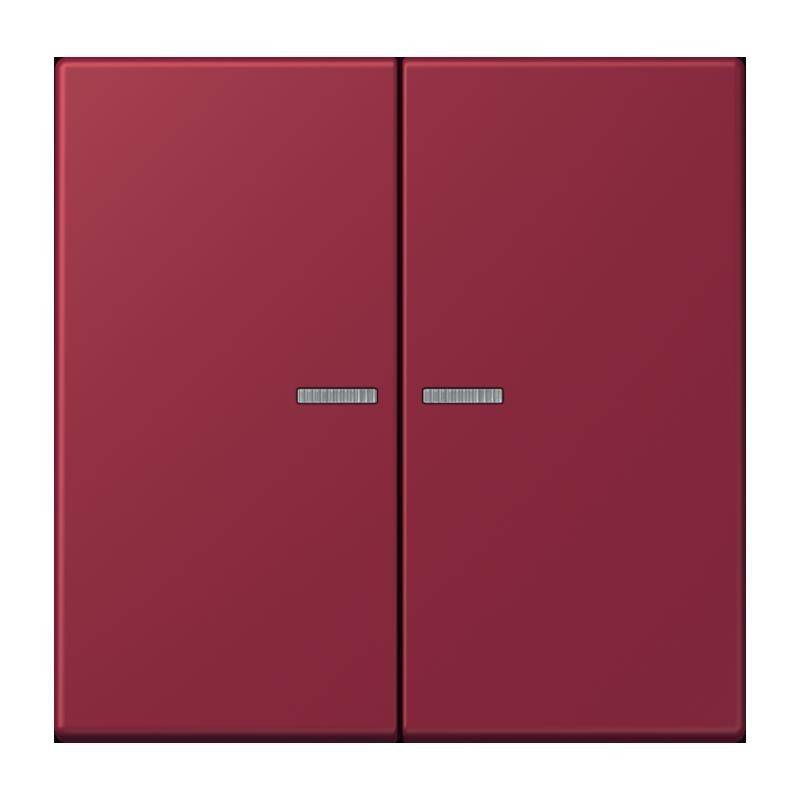 Ein geschlossener roter Doppeltürschrank mit silbernen Griffen.