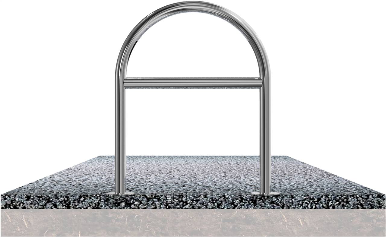 Eine Metallrohrschalung ist in einer Betonsockel eingebettet, um in Bauprojekten glatte, abgerundete Kanten zu schaffen.