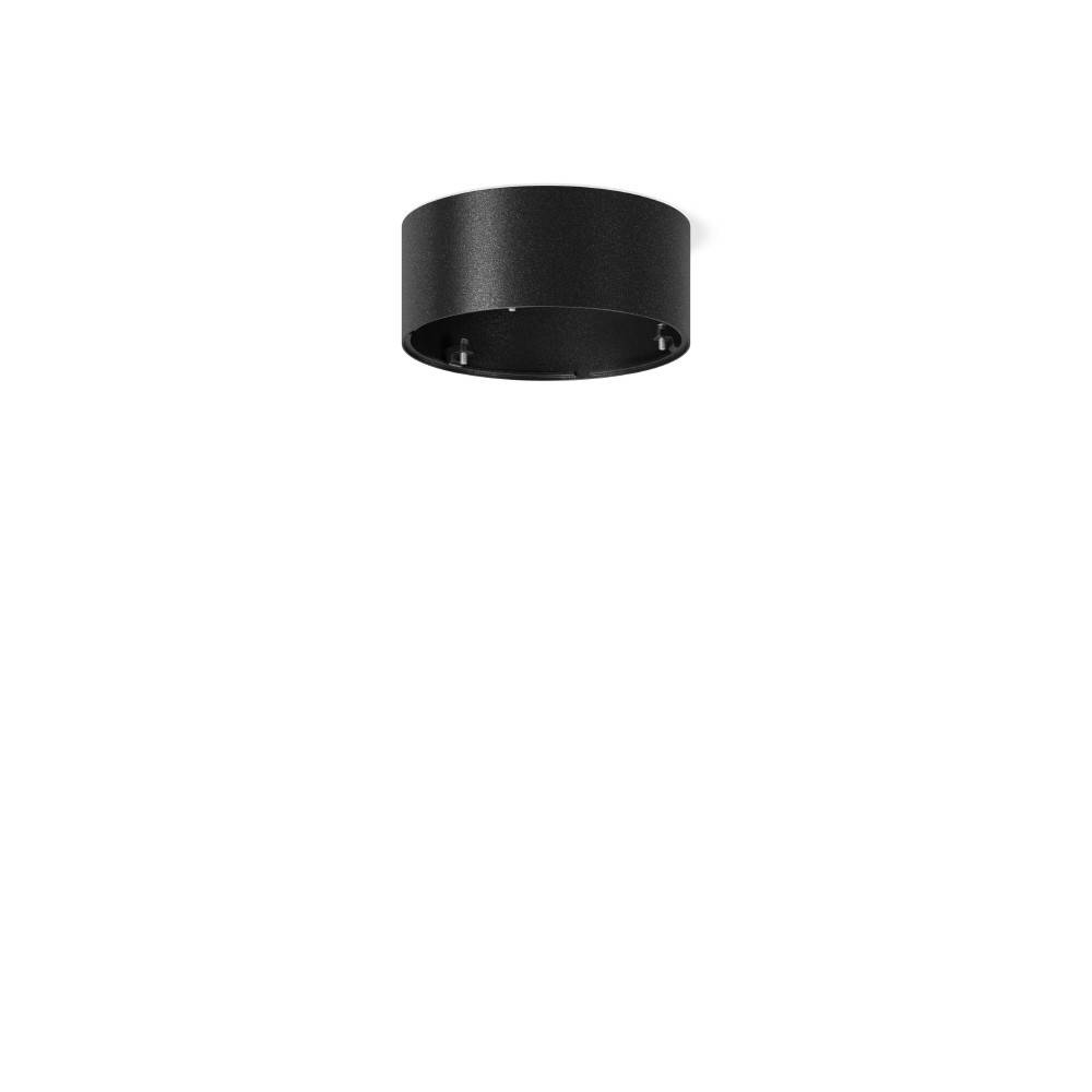 Eine schwarze, zylindrische Deckenleuchte mit minimalistischem Design, an einer weißen Decke montiert.