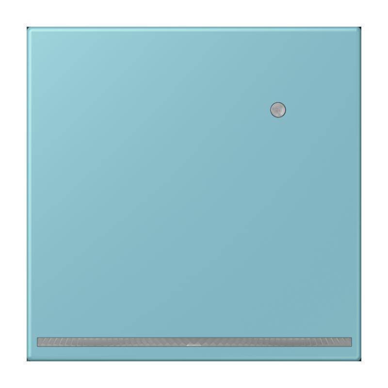 Ein hellblau farbiges quadratisches Panel mit einem kleinen runden Knopf nahe der oberen rechten Ecke und einem schmalen Lüftungsschlitz am unteren Rand.