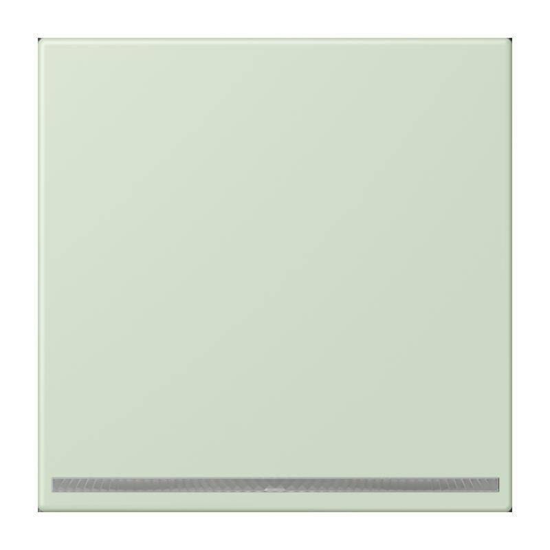 Ein hellgrünes quadratisches Fliesenstück mit einem kleinen horizontalen schwarzen Streifen nahe der unteren Kante.