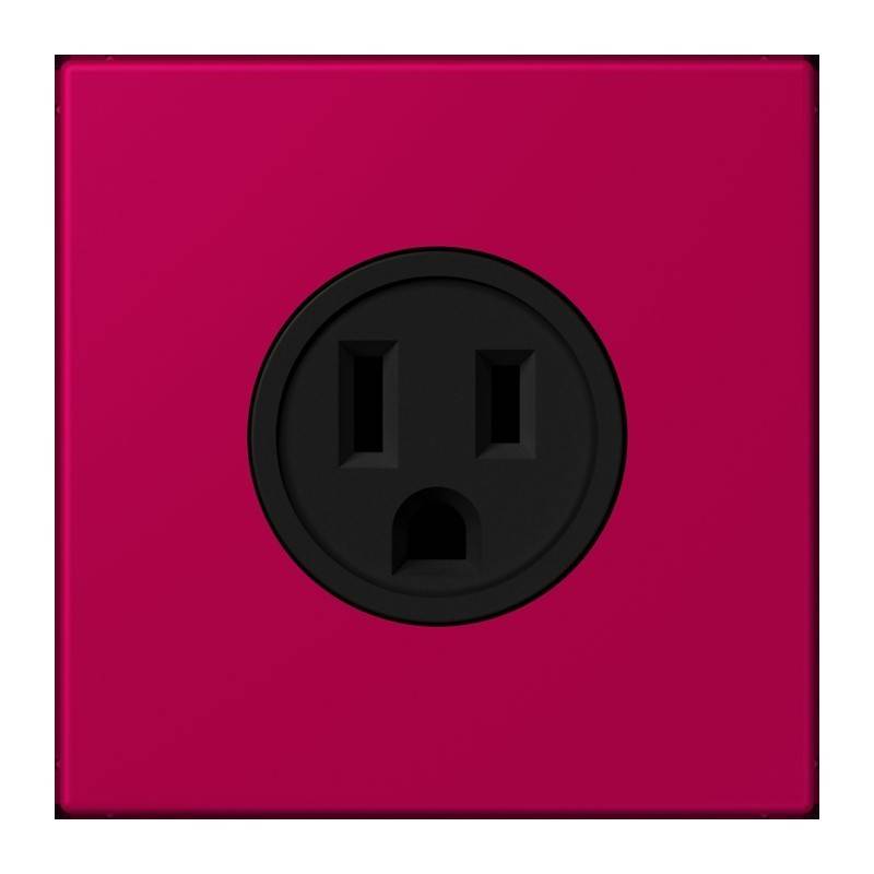 Nahaufnahme einer Standard-Steckdose in Schwarz auf einer leuchtend pinken Wand.