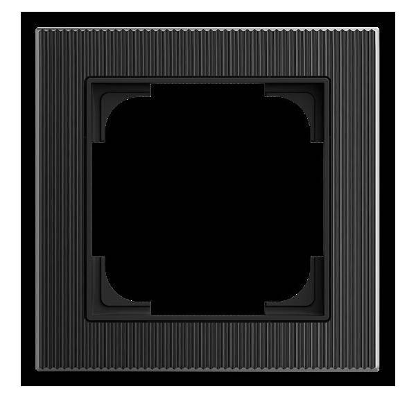 Ein schwarzer gerippter quadratischer Rahmen mit offenem Zentrum, von oben betrachtet.