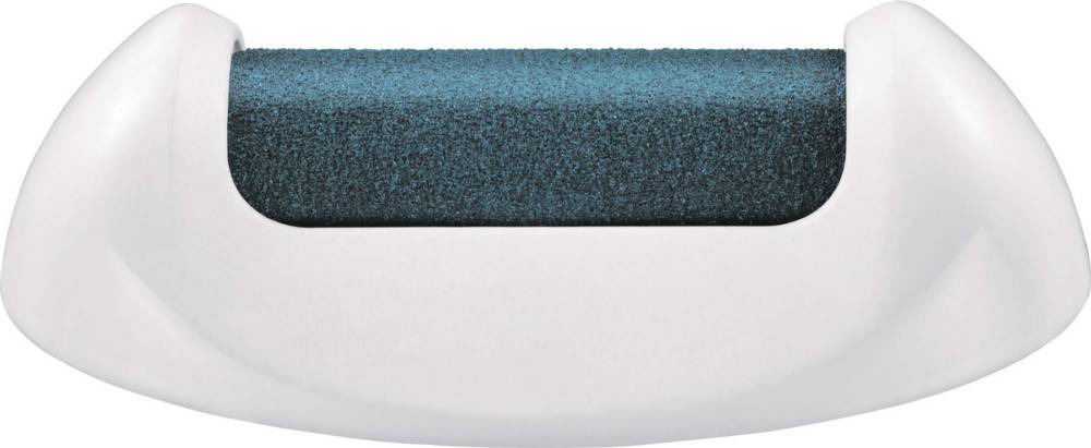 Ein dunkelblauer Bimsstein mit rauer Textur liegt auf einem weißen Hintergrund. Die rechteckige Form des Steins ist deutlich sichtbar.