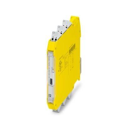 Ein gelbes elektronisches Modul mit weißer Beschriftung, montiert auf einer metallischen Schiene, wahrscheinlich ein Sicherheits- oder Steuergerät, mit sichtbaren Steckverbindungen.