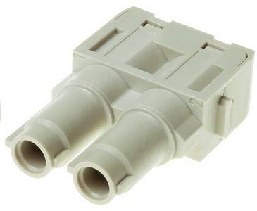 Ein kleiner, beige Duplex-LC-Glasfaseradapter mit zwei Anschlussports, der zum Verbinden von Glasfaserkabeln in Netzwerkinstallationen verwendet wird.