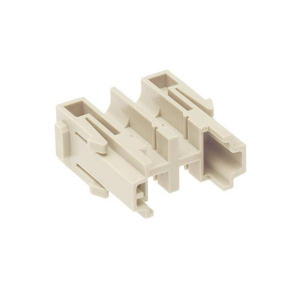 Ein beiger Kunststoff-Anschlussgehäuse mit mehreren Steckplätzen für elektrische Anschlüsse, entwickelt zum Sichern und Organisieren von Kabelverbindungen.