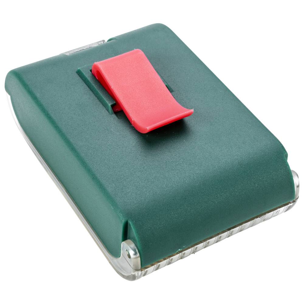 Ein grün und rot selbstfärbendes Stempel mit transparenter Basis, entworfen für schnelle und einfache wiederholte Stempelaufgaben.