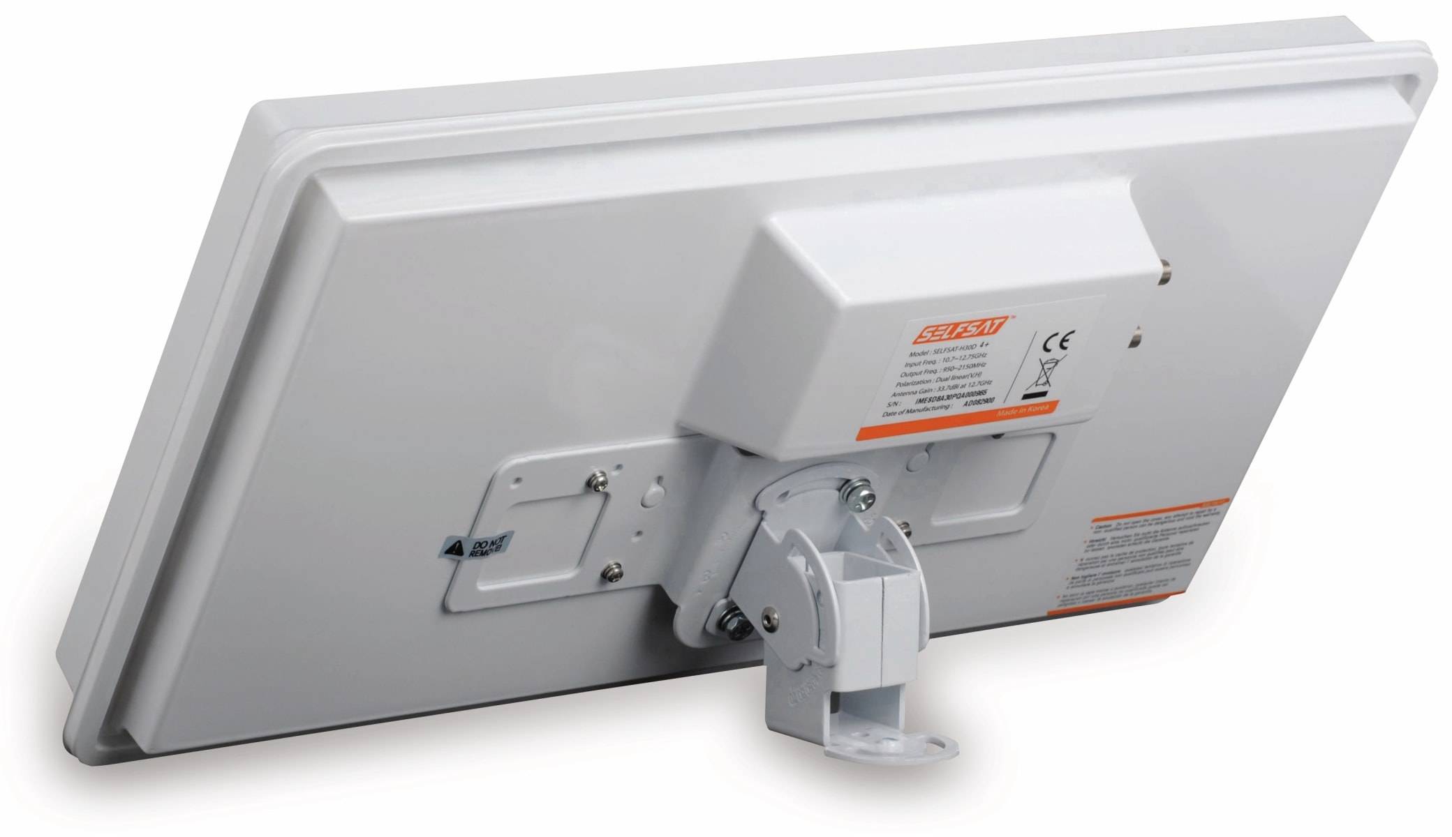 Das Bild zeigt die Rückseite eines wandmontierten Geräts mit einer robusten Metallhalterung, Schrauben und einem Etikett mit technischen Details.