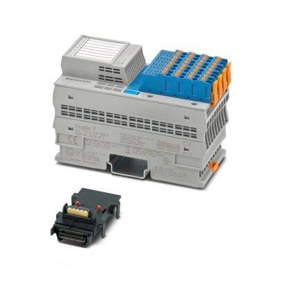 Ein grau-blaues Elektrogerät mit Anschlüssen sitzt neben einer schwarzen Komponente, möglicherweise für Industrie- oder Automatisierungszwecke verwendet.