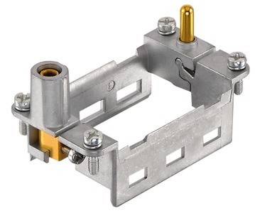 Metallische Halterung mit vertikalen Stifte und Schrauben, wahrscheinlich zum Befestigen einer elektrischen Komponente oder eines Geräts.