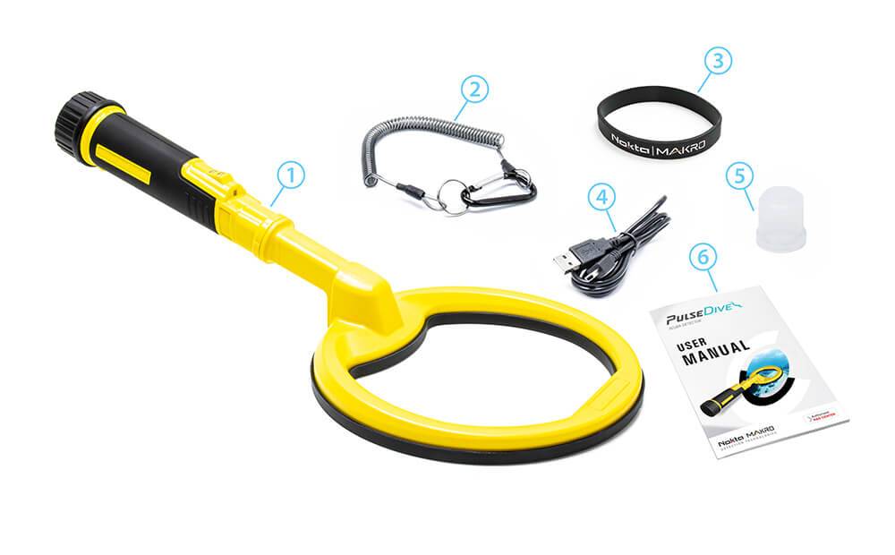 Ein gelber Metalldetektor mit einer kreisförmigen Suchspule. In der Nähe befinden sich eine Zubehörclip, ein Armband, ein USB-Kabel und eine Bedienungsanleitung.