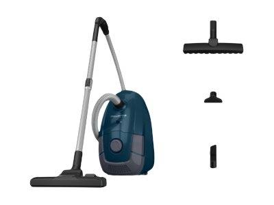 Ein blauer Kanisterstaub­sauger mit einem Schlauch und drei auswechselbaren Bodenaufsätzen, der für vielseitiges Reinigen konzipiert ist.