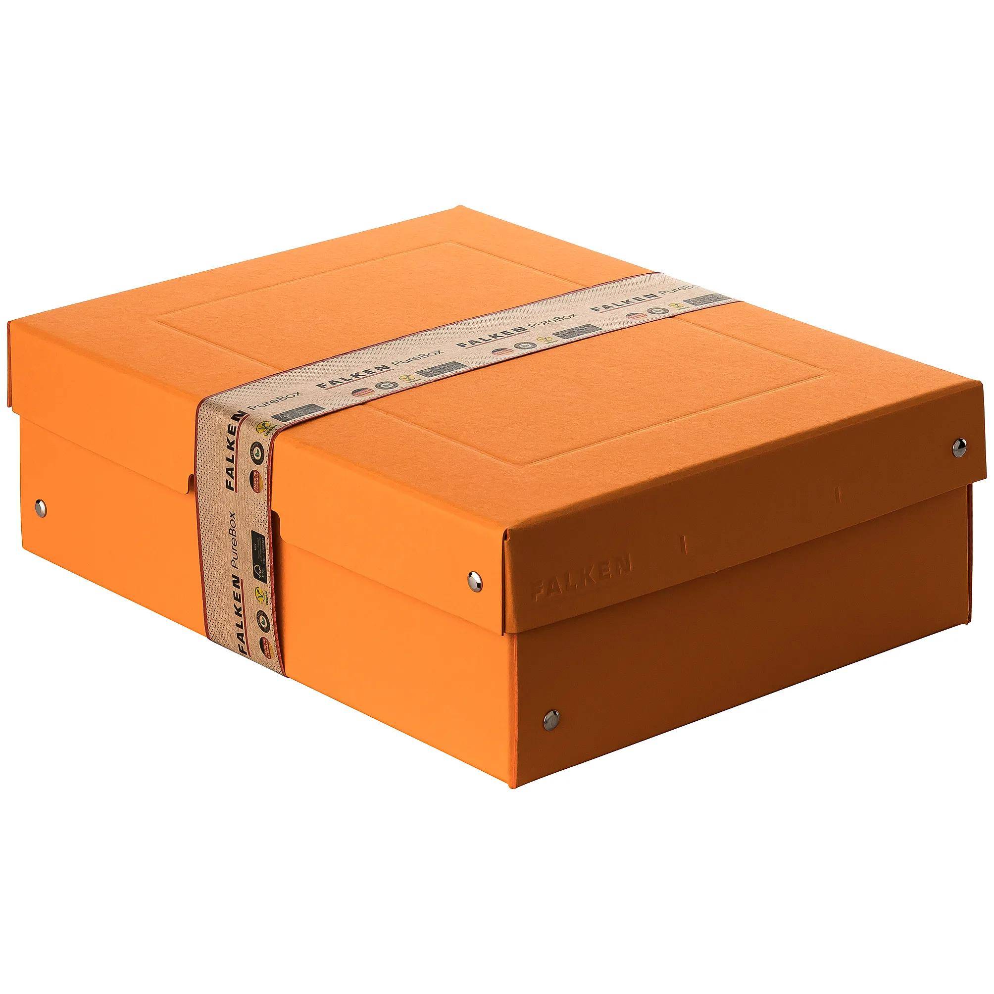 Eine orangefarbene IKEA FJÄLLA-Box mit einem beigen Riemen, die auf einer Oberfläche ruht.