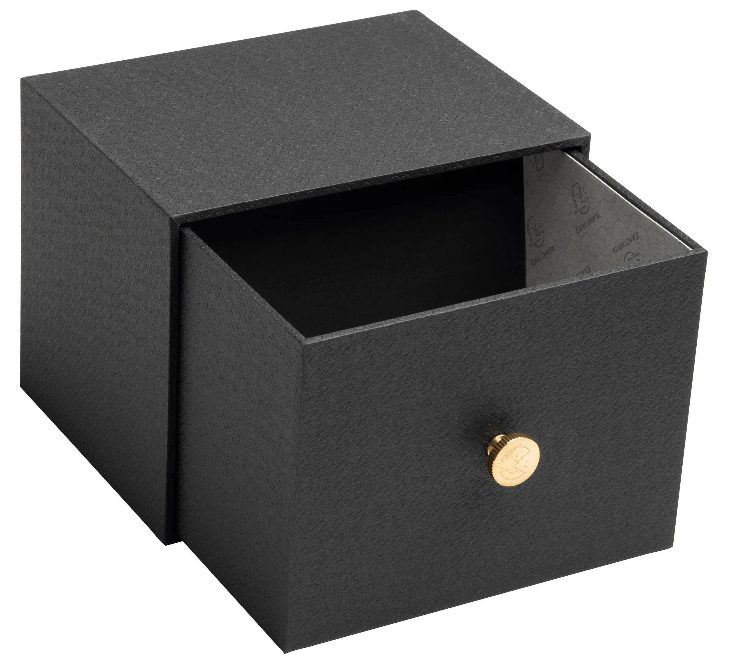 Schwarze strukturierte offene Schublade mit einem runden goldenen Griff, die ein leeres inneres Fach offenbart.