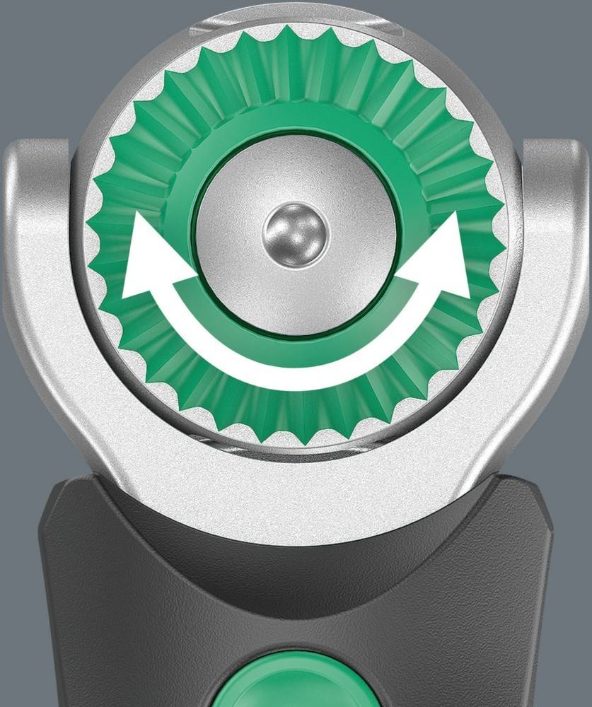 Ein grünes und silbernes kreisförmiges Zifferblatt mit weißen Pfeilen, die eine Drehung im Uhrzeigersinn anzeigen, möglicherweise ein Kontroll- oder Einstellmechanismus.