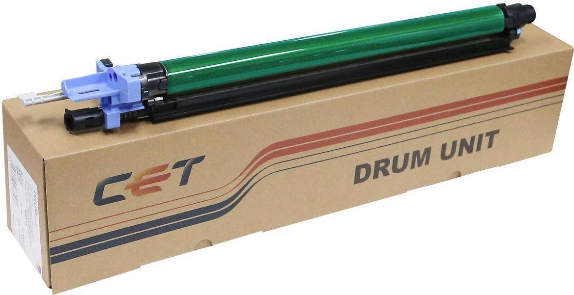 Eine Bildtrommel sitzt auf einer Kartonbox mit der Aufschrift 