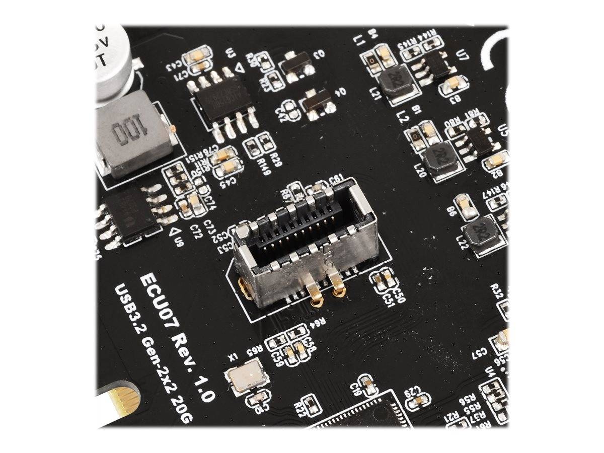 Nahaufnahme einer schwarzen Leiterplatte mit einem zentralen USB-C-Anschluss und verschiedenen Chips sowie oberflächenmontierten Komponenten.