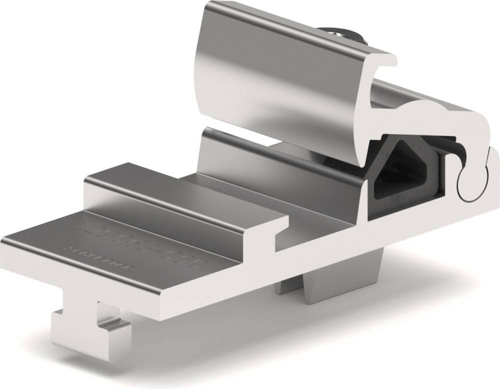 Ein metallischer, eckiger Adapter mit Befestigungsmechanismus, der entwickelt wurde, um Zubehör sicher an einer Kamera oder ähnlicher Ausrüstung zu befestigen.