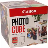 Canon Photo Cube Creative Pack Box zum Erstellen eines personalisierten Fotowürfels, dargestellt mit Beispielbildern von Fotowürfeln auf der Verpackung.