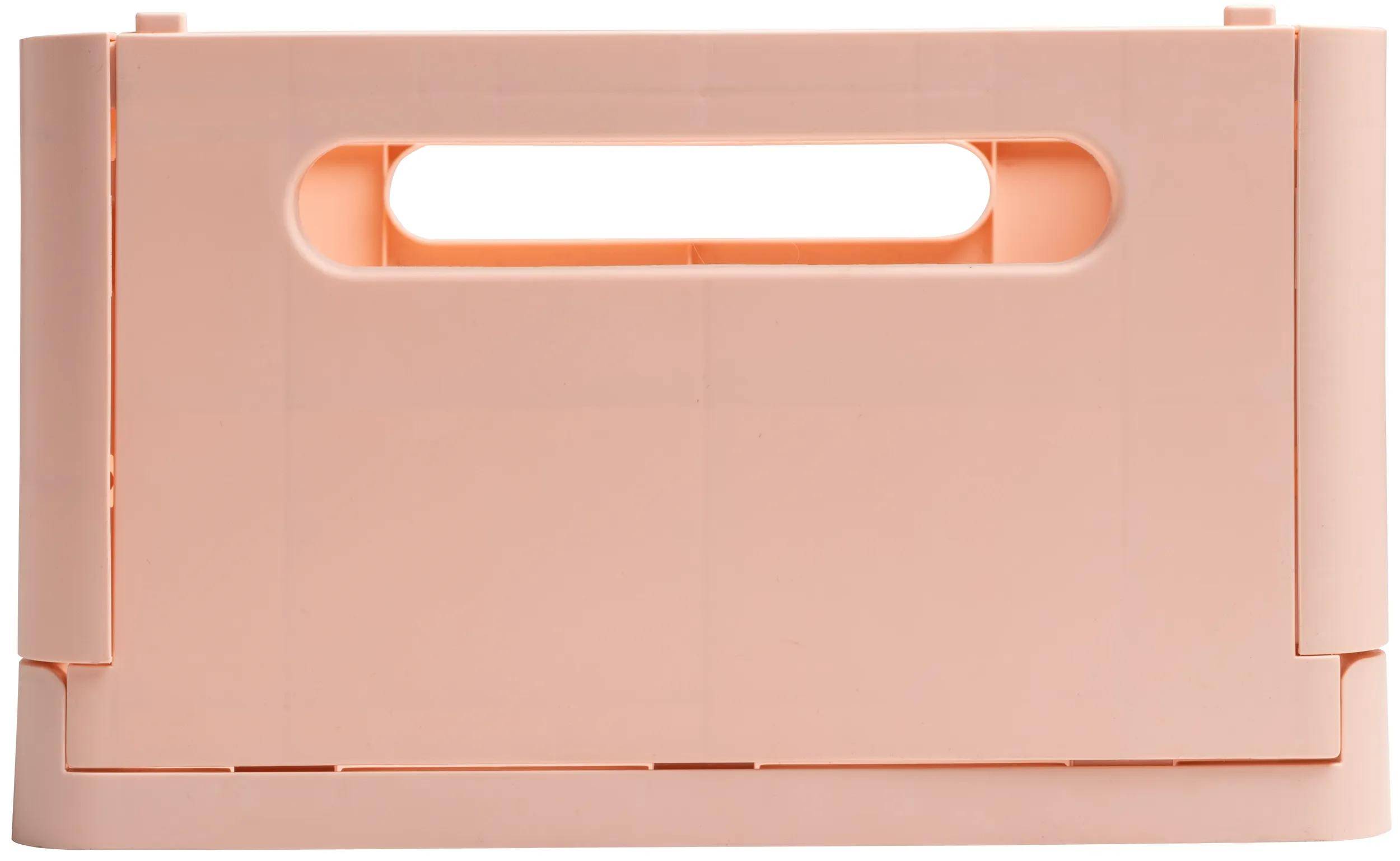 Eine beige Kunststoffkiste mit einem horizontalen Griffausschnitt in der Nähe der Oberkante, die zum einfachen Tragen und Stapeln konzipiert ist, keine sichtbaren Inhalte.