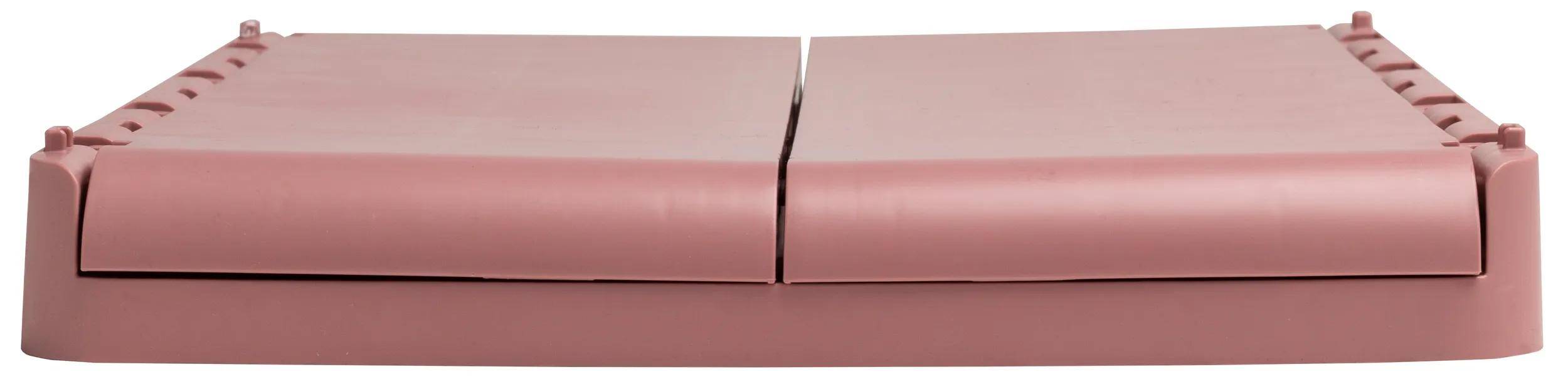 Eine teilweise geöffnete rosa Schublade mit sauberen Kanten und einem eleganten Design.