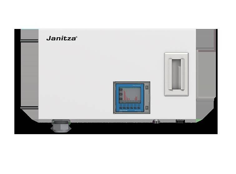 Ein weißes Janitza-Elektrogerät mit einem Display, das einen Balkendiagramm zeigt, der möglicherweise elektrische Messungen anzeigt.