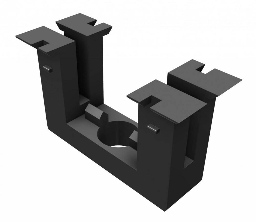 3D-Modell einer schwarzen, rechteckigen mechanischen Komponente mit Kerben und einem zentralen kreisförmigen Loch, wahrscheinlich für eine strukturelle Montage verwendet.