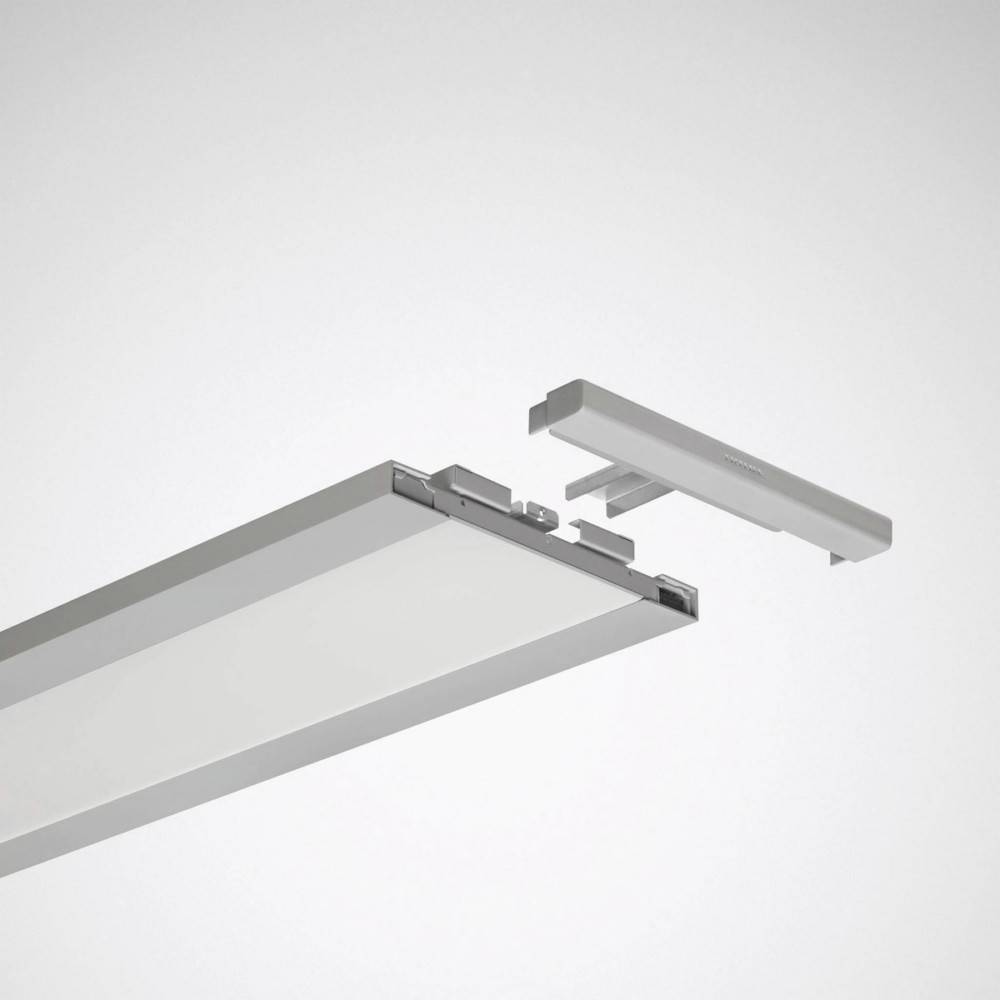 Eine Explosionszeichnung einer rechteckigen LED-Flächenleuchte, die das Hauptpanel und abnehmbare Komponenten vor einem schlichten Hintergrund zeigt.