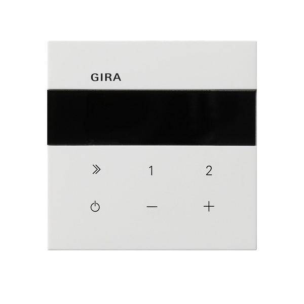GIRA-Wandsteuerungspanel mit Energie-, Pfeil-, Nummer- und Lautstärketasten, zur Steuerung elektronischer Geräte.