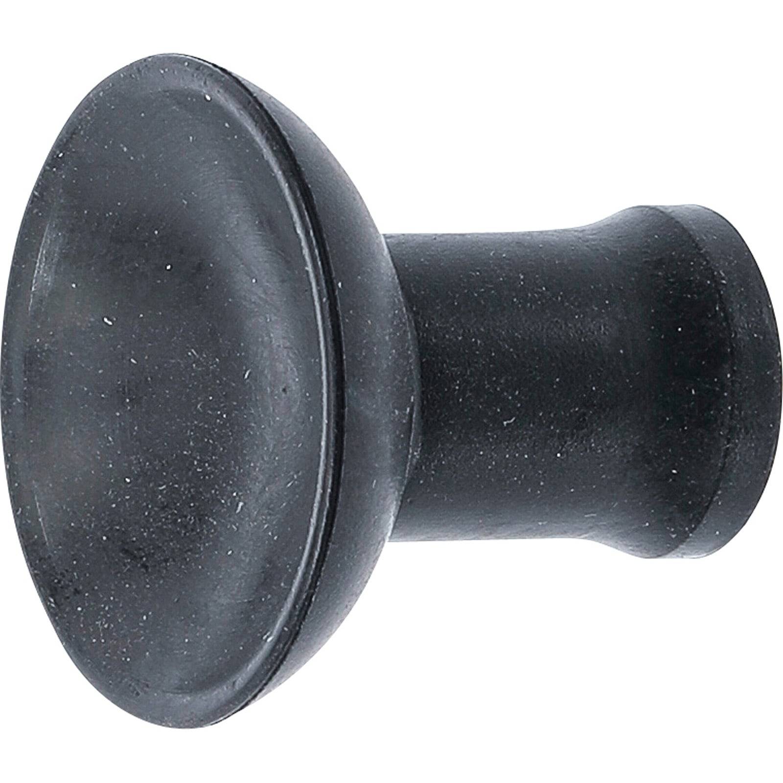 Ein schwarzer Türstopper aus Gummi mit abgerundeter Spitze und zylindrischer Basis, der dazu dient, Türen davor zu schützen, Wände zu beschädigen.