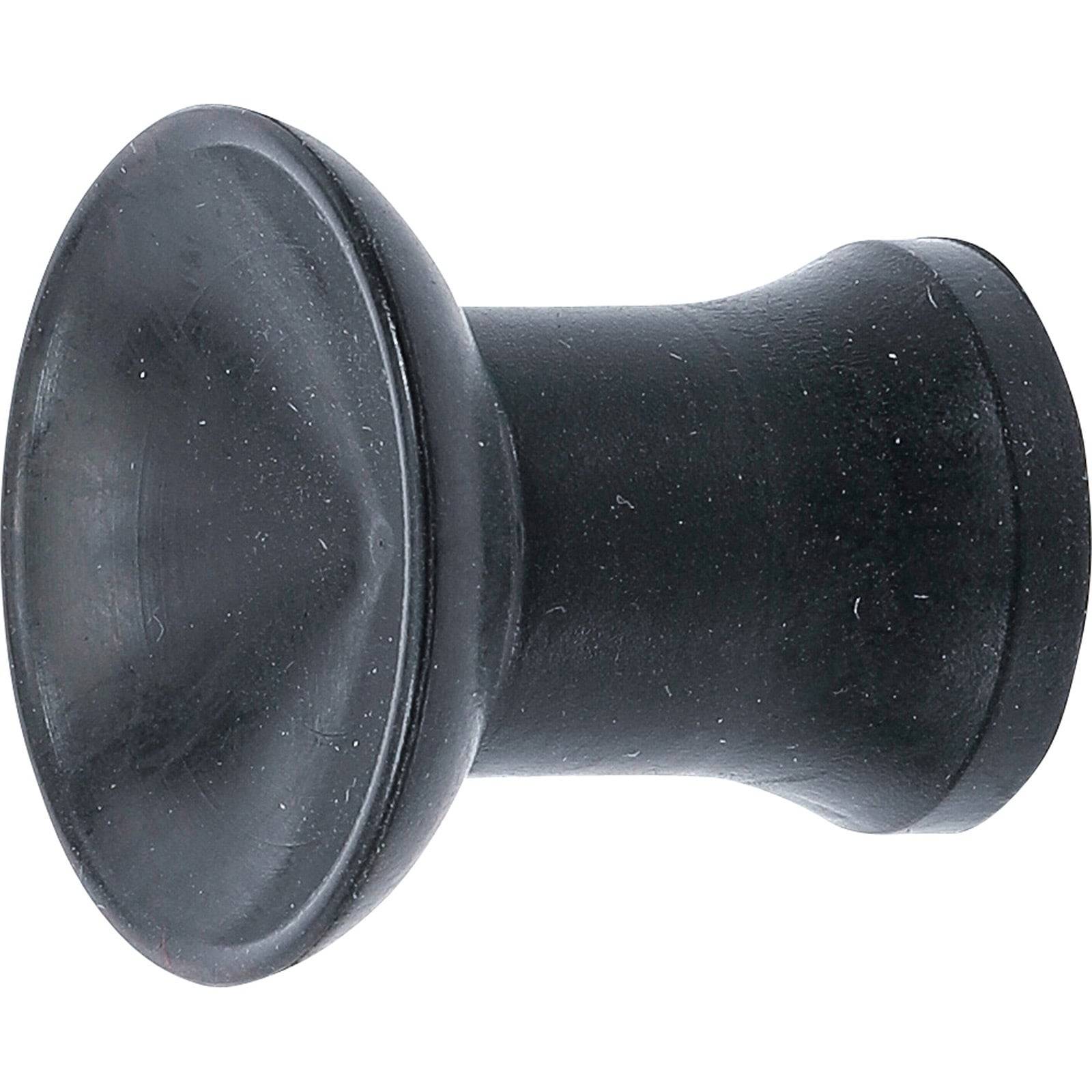 Ein schwarzer, gummierter Türkeil mit breiter Basis und konischer Spitze, der dazu dient, Türen am Schließen zu hindern oder Wandschäden zu verhindern.