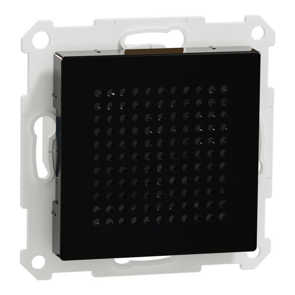 Ein schwarzes quadratisches Gitterpanel, das auf einem weißen Rahmen montiert ist, möglicherweise eine elektronische Komponente oder Teil eines größeren Geräts.